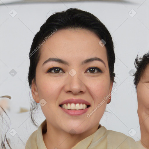 Joyful asian young-adult female with medium  brown hair and brown eyes