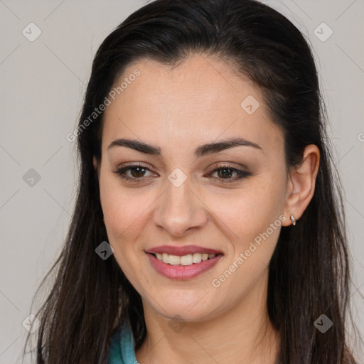 Joyful asian young-adult female with long  brown hair and brown eyes