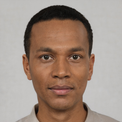 Neutral black young-adult male with short  black hair and brown eyes