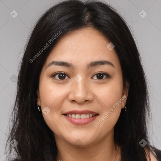 Joyful latino young-adult female with long  brown hair and brown eyes