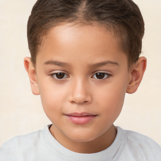 Joyful white child female with short  brown hair and brown eyes