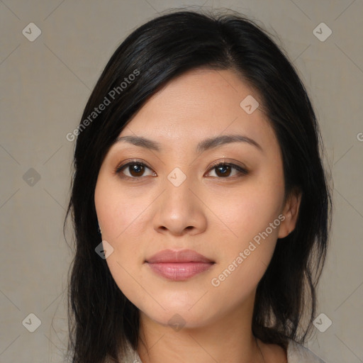 Joyful asian young-adult female with medium  black hair and brown eyes