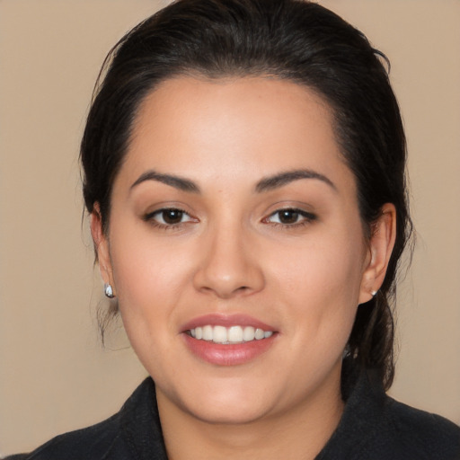 Joyful white young-adult female with medium  black hair and brown eyes