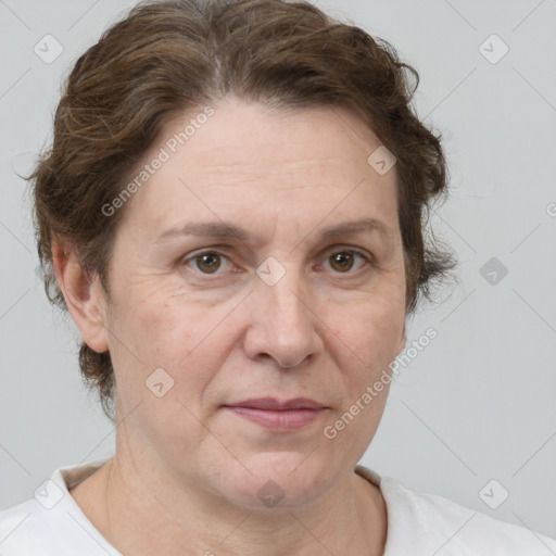 Joyful white adult female with short  brown hair and brown eyes