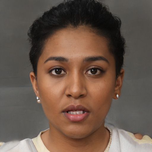 Neutral black young-adult female with short  brown hair and brown eyes