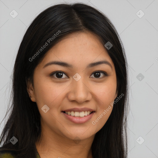 Joyful asian young-adult female with long  brown hair and brown eyes