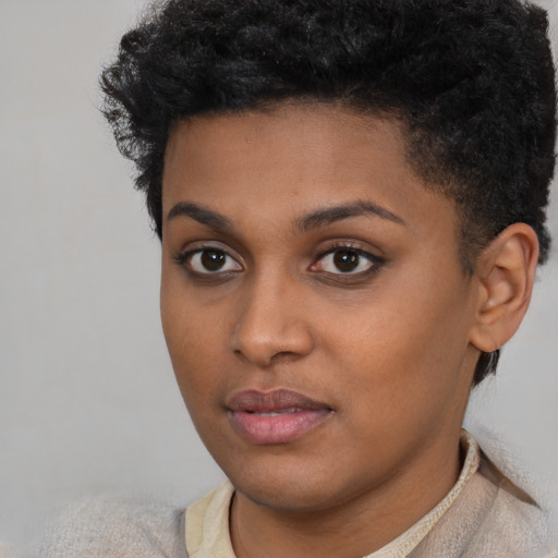 Neutral black young-adult female with short  black hair and brown eyes