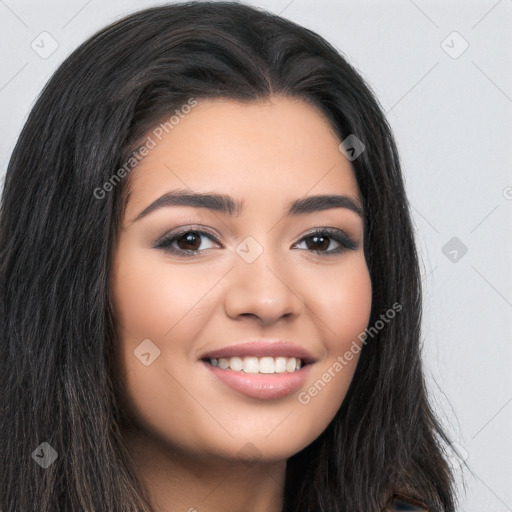 Joyful latino young-adult female with long  brown hair and brown eyes