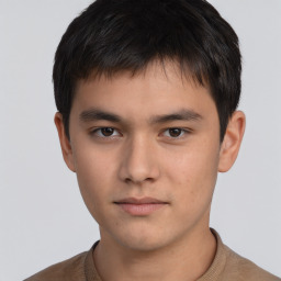 Neutral asian young-adult male with short  brown hair and brown eyes