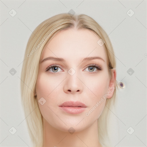 Joyful white young-adult female with long  brown hair and blue eyes