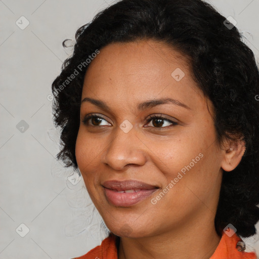 Joyful latino young-adult female with medium  black hair and brown eyes