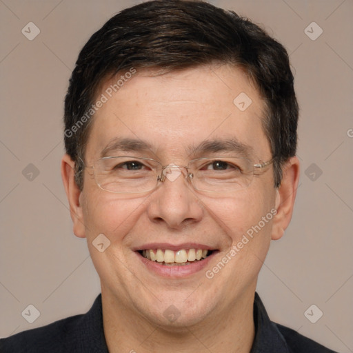 Joyful white adult male with short  brown hair and brown eyes