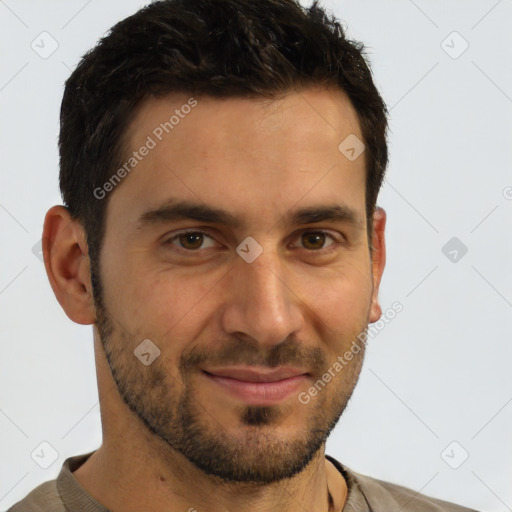 Joyful white young-adult male with short  brown hair and brown eyes