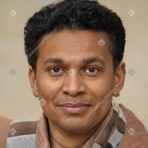 Joyful latino adult male with short  black hair and brown eyes