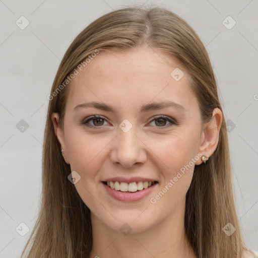 Joyful white young-adult female with long  brown hair and grey eyes