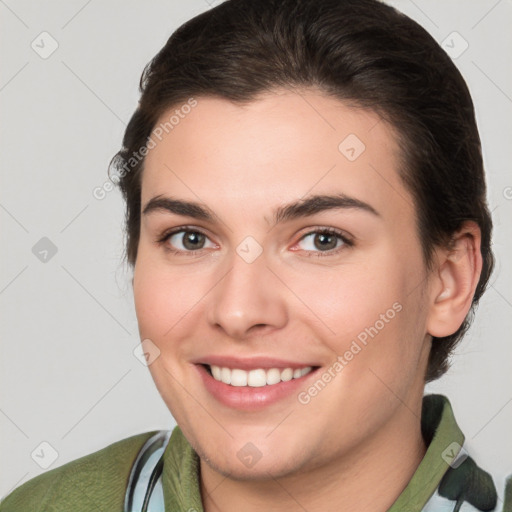 Joyful white young-adult female with medium  brown hair and brown eyes