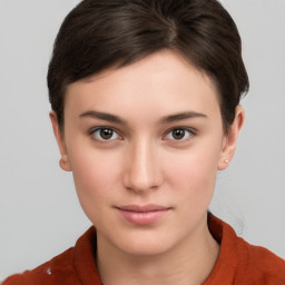 Neutral white young-adult female with short  brown hair and brown eyes