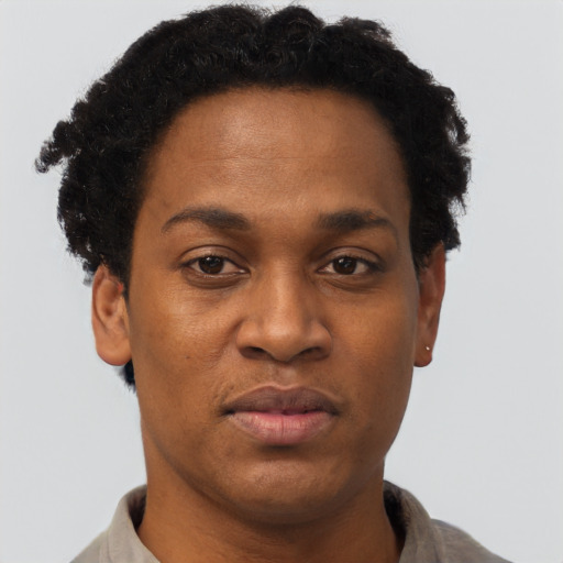 Neutral black young-adult female with short  brown hair and brown eyes