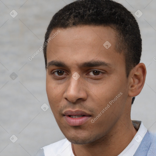 Neutral white young-adult male with short  black hair and brown eyes