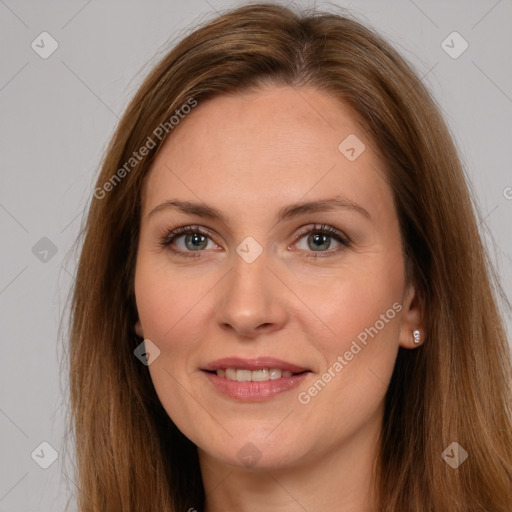 Joyful white adult female with long  brown hair and brown eyes