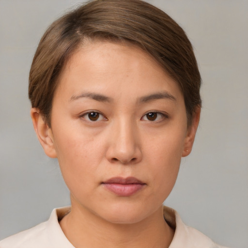 Neutral white young-adult female with short  brown hair and brown eyes