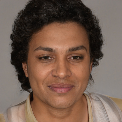 Joyful white adult female with short  brown hair and brown eyes