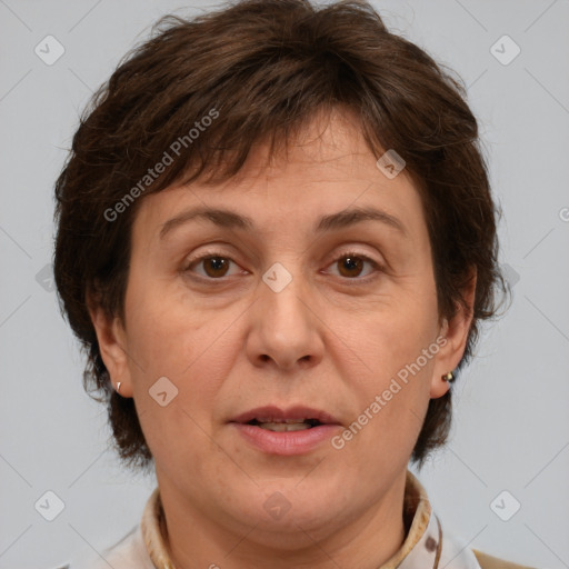 Joyful white adult female with medium  brown hair and brown eyes