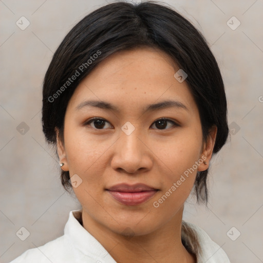 Joyful asian young-adult female with medium  black hair and brown eyes