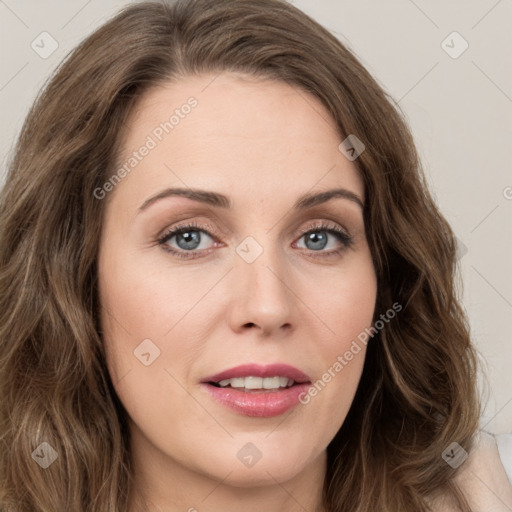 Joyful white young-adult female with long  brown hair and green eyes