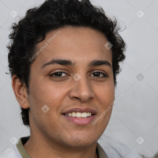 Joyful latino young-adult male with short  brown hair and brown eyes