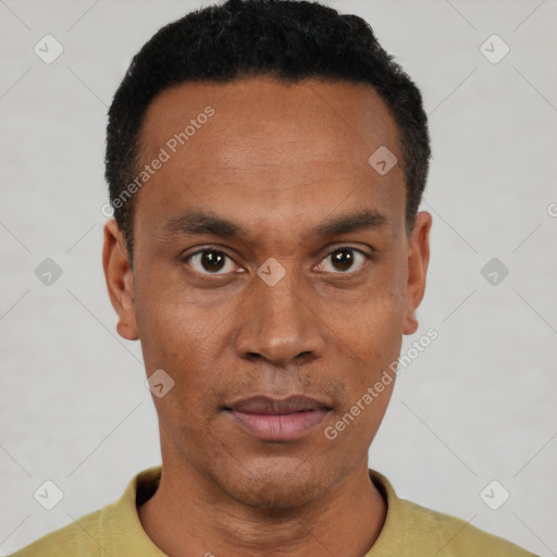 Neutral latino young-adult male with short  black hair and brown eyes