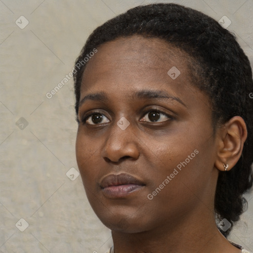 Neutral black young-adult female with short  black hair and brown eyes