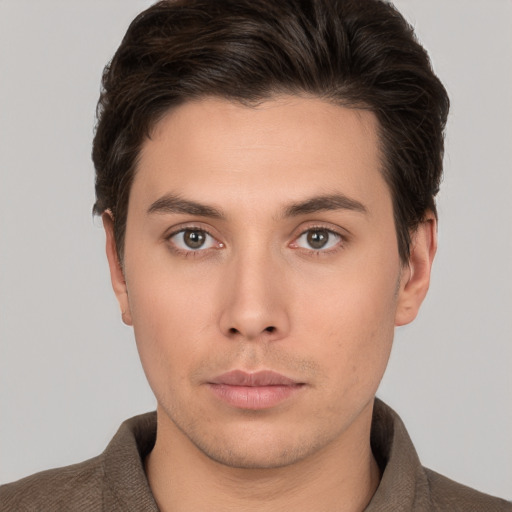 Neutral white young-adult male with short  brown hair and brown eyes