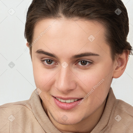 Joyful white young-adult female with short  brown hair and brown eyes