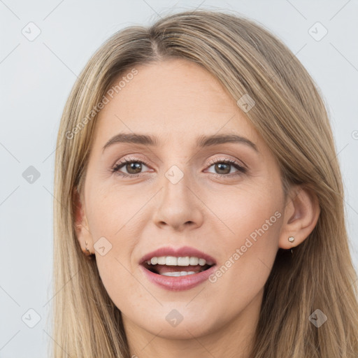 Joyful white young-adult female with long  brown hair and brown eyes