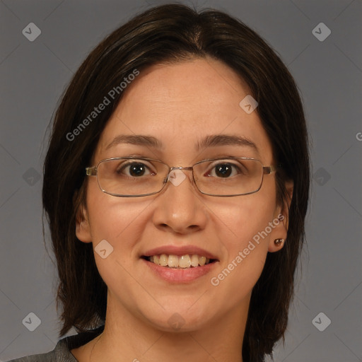 Joyful white adult female with medium  brown hair and brown eyes