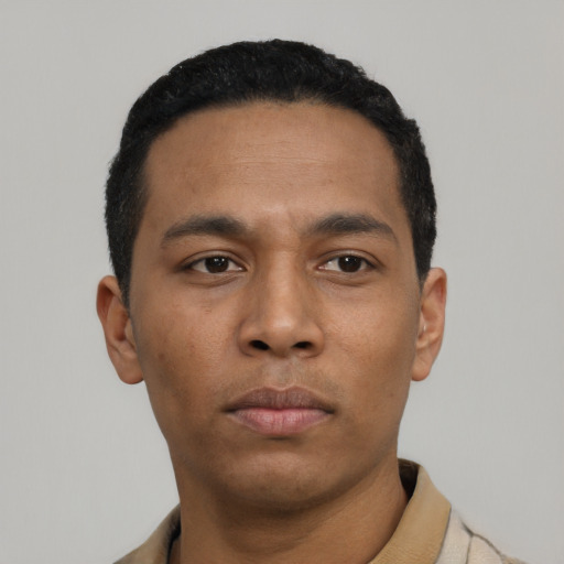 Neutral latino young-adult male with short  black hair and brown eyes