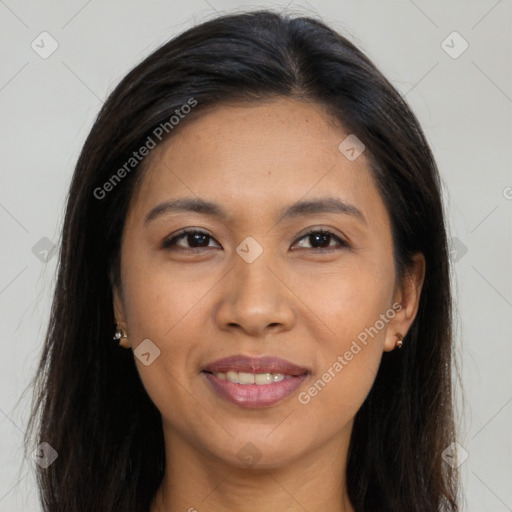 Joyful asian young-adult female with long  brown hair and brown eyes