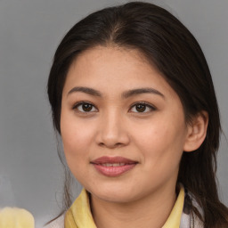 Joyful asian young-adult female with medium  brown hair and brown eyes