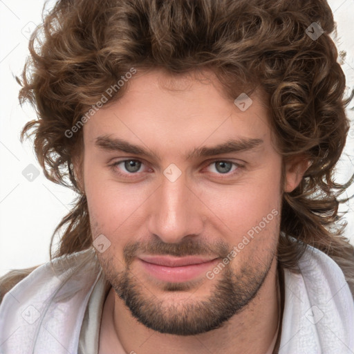 Joyful white young-adult male with medium  brown hair and brown eyes