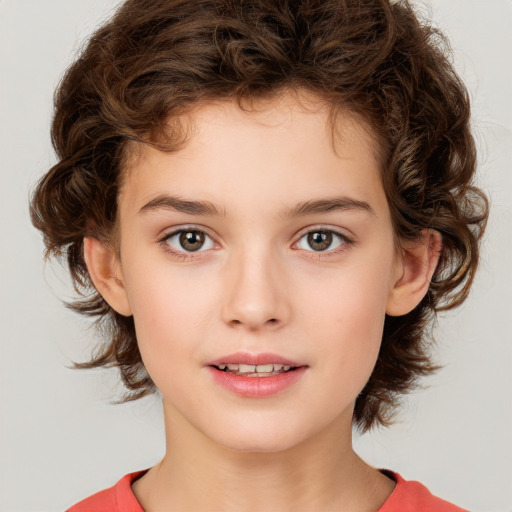 Joyful white child female with medium  brown hair and brown eyes