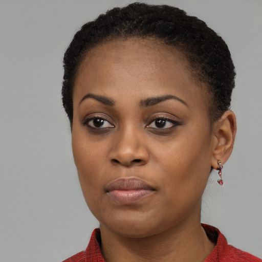 Neutral black young-adult female with short  black hair and brown eyes