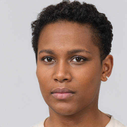 Neutral black young-adult female with short  brown hair and brown eyes