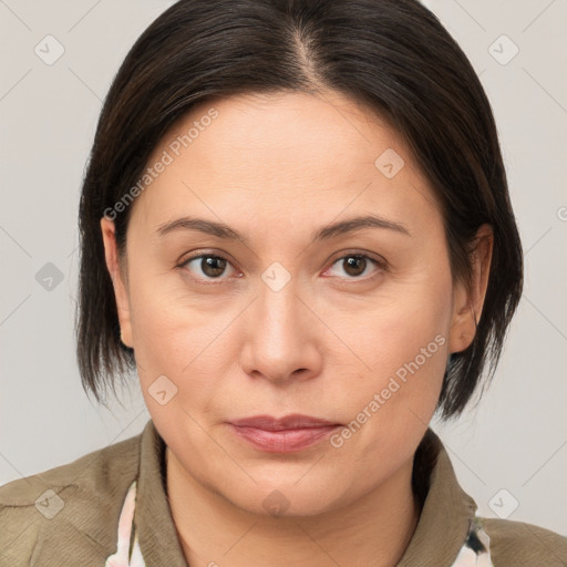 Joyful white adult female with medium  brown hair and brown eyes