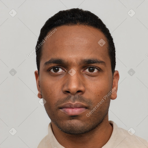 Neutral black young-adult male with short  black hair and brown eyes