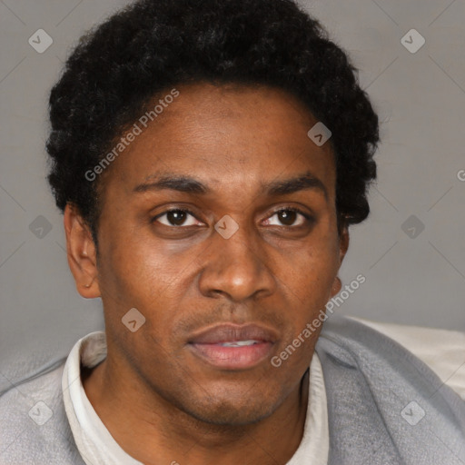 Neutral black adult male with short  black hair and brown eyes