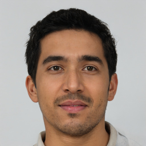 Neutral latino young-adult male with short  black hair and brown eyes