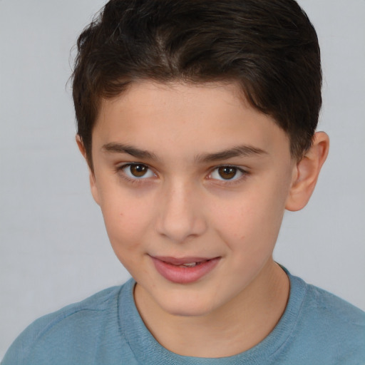 Joyful white child female with short  brown hair and brown eyes