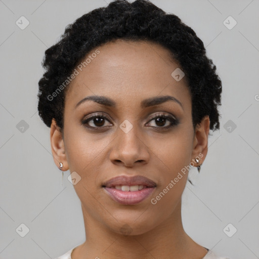 Joyful black young-adult female with short  black hair and brown eyes