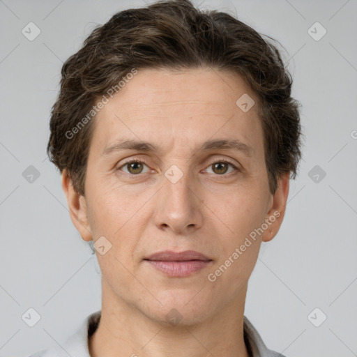 Joyful white adult male with short  brown hair and grey eyes